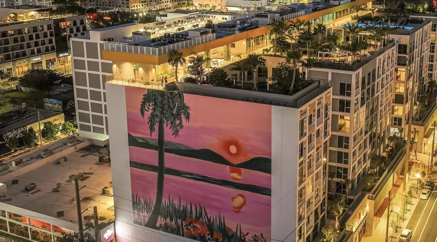 Aerial view of a South Florida apartment neighborhood at dusk